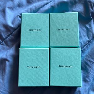 4 authentic Tiffany & Co boxes.